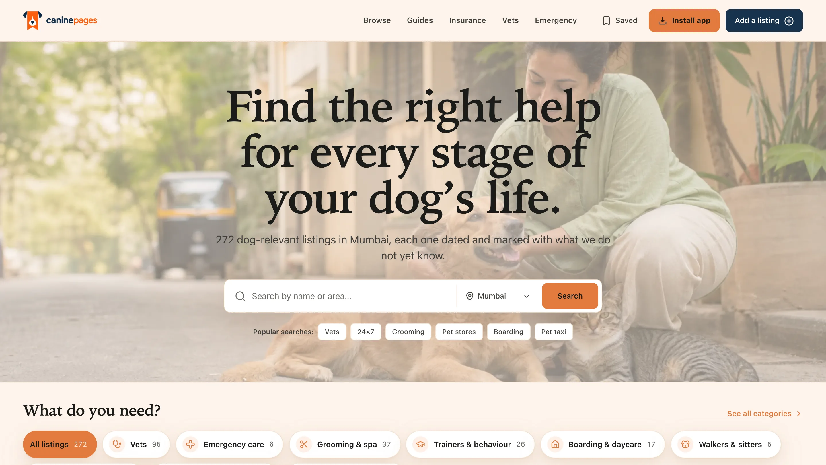 CaninePages home page with a city search for Mumbai, a headline reading "Find the right help for every stage of your dog’s life", and a row of category chips showing counts for vets, emergency care, grooming, trainers, boarding, walkers, dog-friendly places, stores and rescue